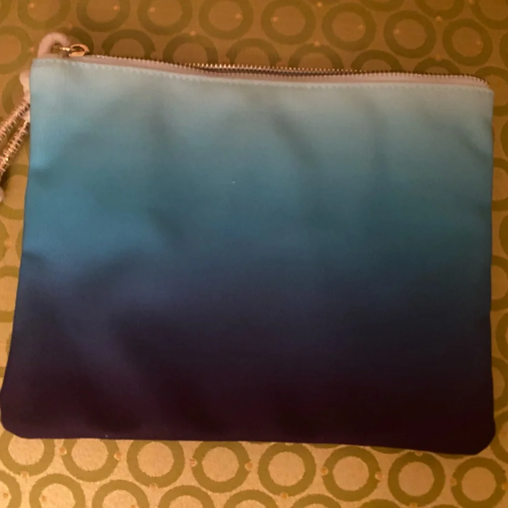 Beach denim pouch with zipped pockets and zipper